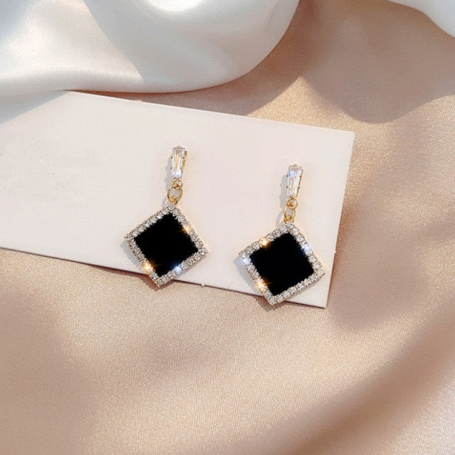 Black round rhinestone earrings